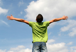 photo of a person with arms outstretched