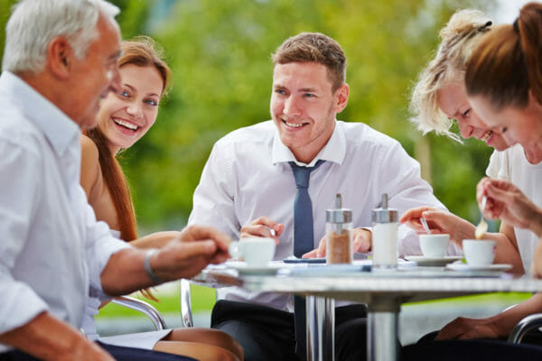 photo of business team having a friendly meeting