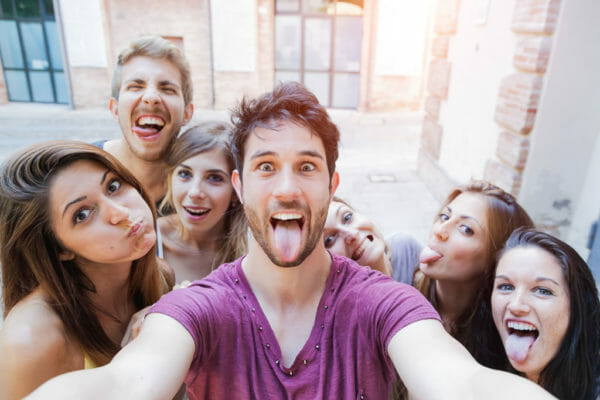 millennials taking a selfie