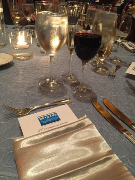 A place setting at the 20th anniversary dinner reception at the National Portrait Gallery