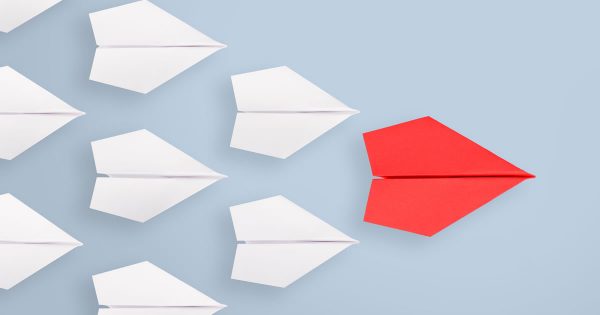 Are you an effective influencer? Ask these 5 questions to see how you stack up. (Origami paper planes in formation with red leader)