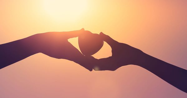 Free for qualified non-profit organizations: Leading Virtually in Challenging Times (image of heart and hands)