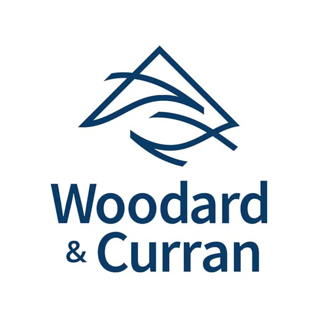 Woodard & Curren logo