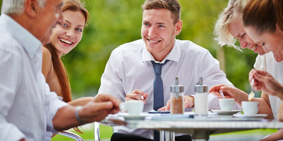 photo of business team having a friendly meeting